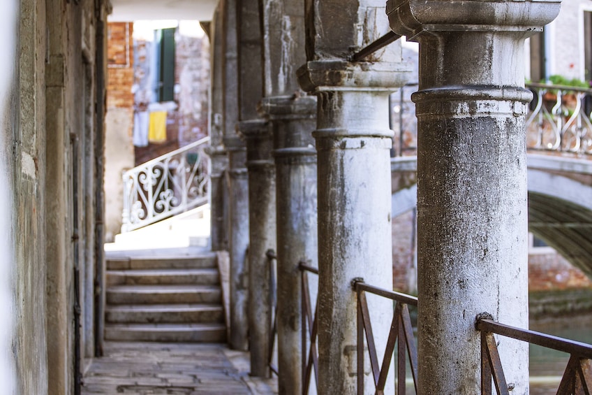Columns of a walkway in Venice