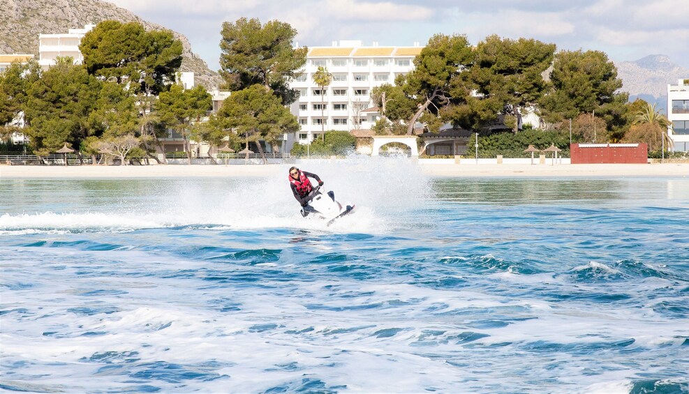 Woman rides jetski near Mallorca