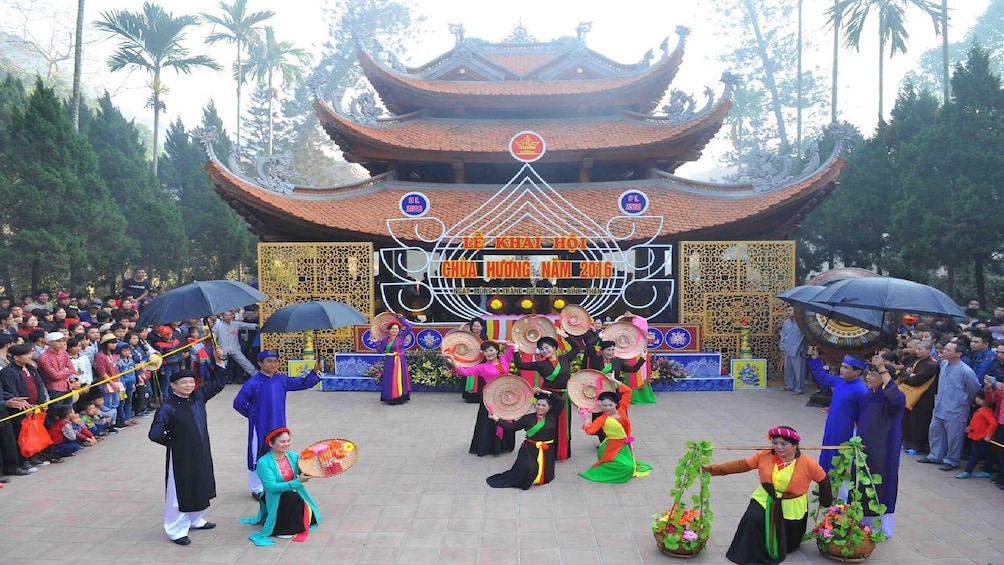 Performers in front of the Perfume Pagoda in Vietnam