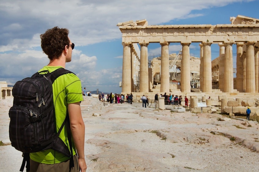 Tourist visiting the Parthenon, Acropolis ruin, Athens, Greece