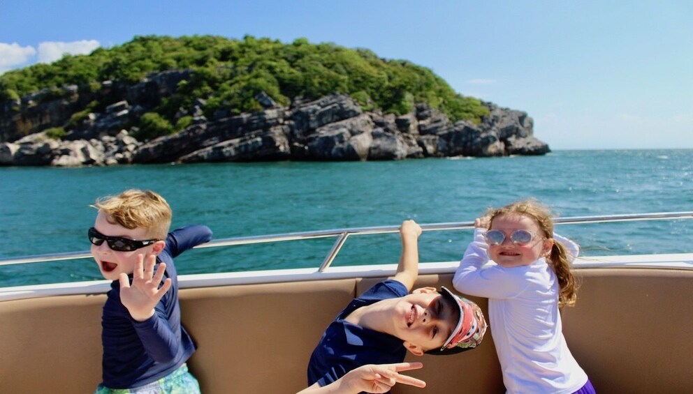 Kids on boat in the Gulf of Thailand