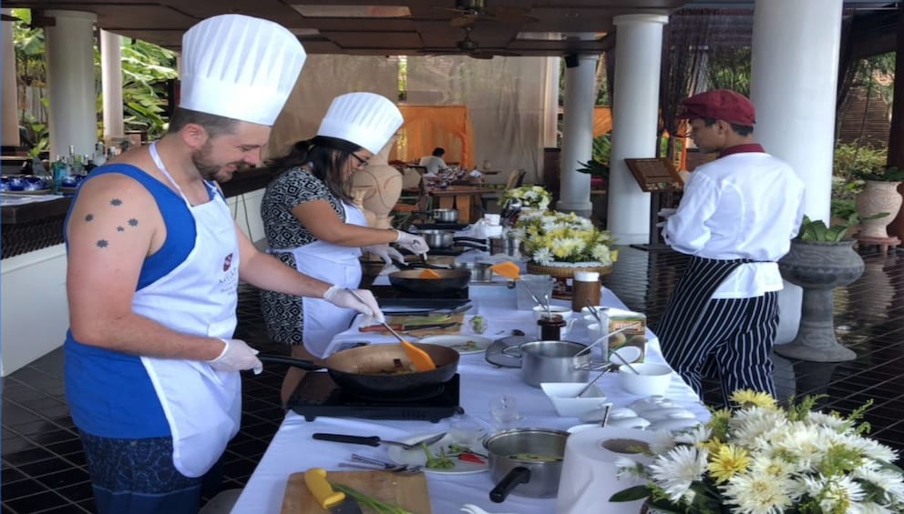 Thai Chefs prepare food at a resort