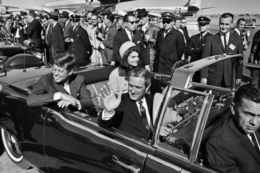 President Kennedy,htt Jackie and Texas Gov. John Connally ride in a limousine moments before Kennedy was assassinated in Dallas on Nov. 22, 1963. Travel the presidential motorcade as part of our tour.