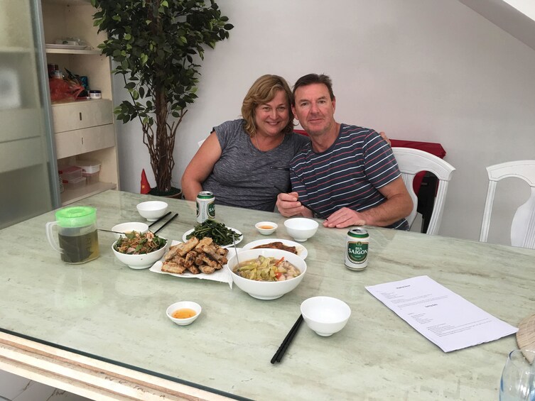 Couple enjoying a meal in Hoi An, Vietnam