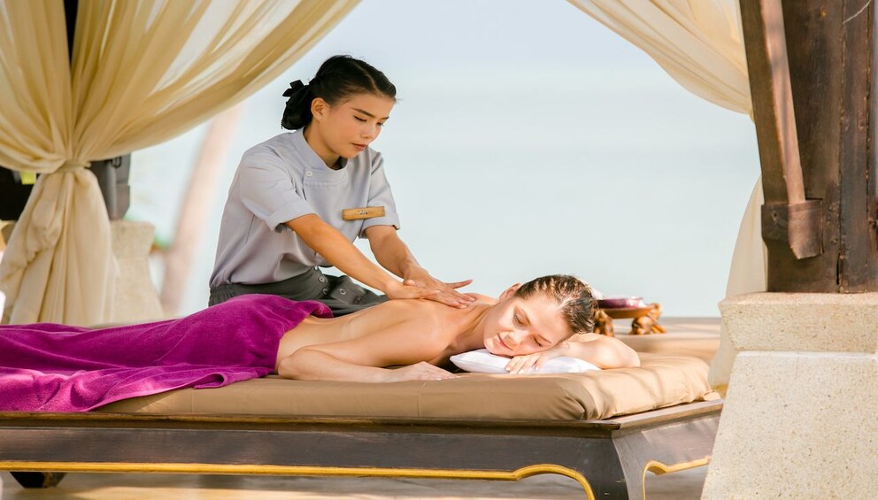Woman getting a massage in a Spa