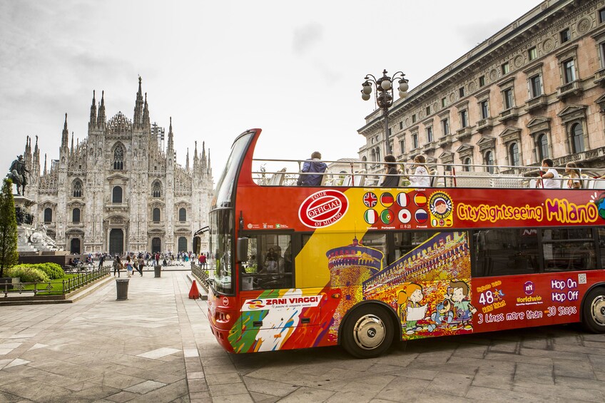 Milan Hop On Hop Off bus in front of the Duomo di Milano