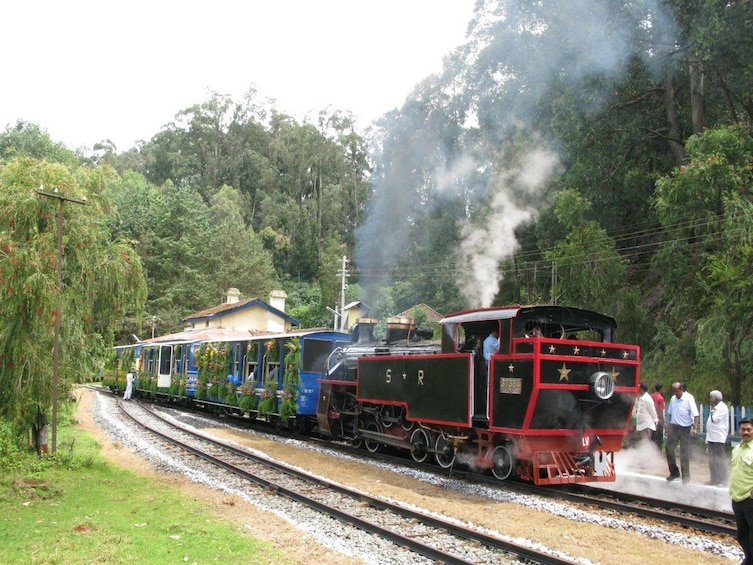 Show item 4 of 4. Visit Ooty by Toy Train