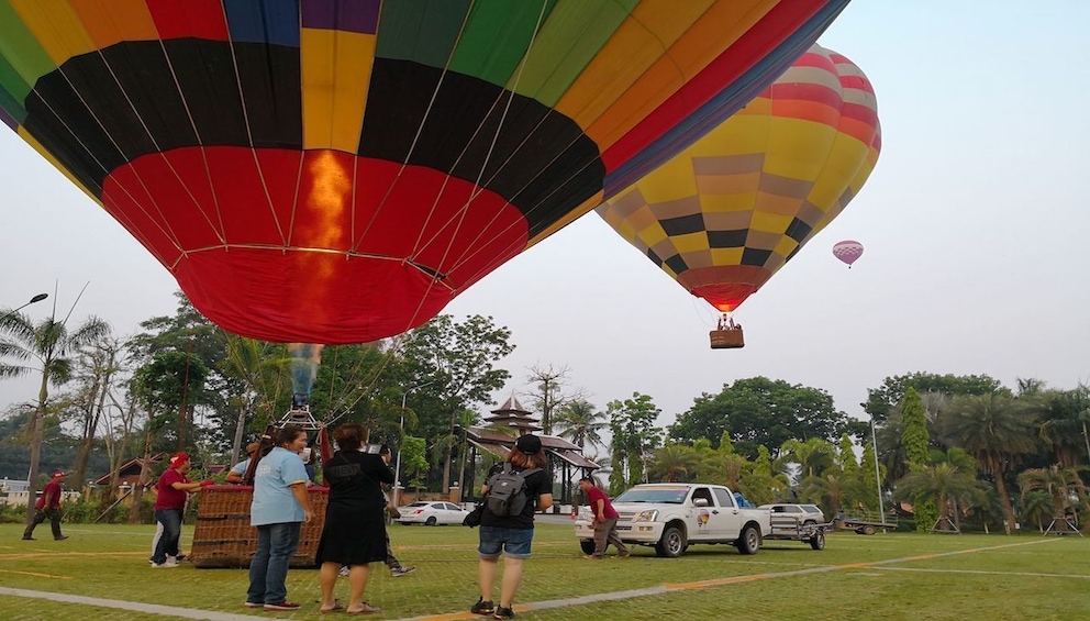 Visitors getting ready to depart on a Hot Air Balloon flight in Chiang Mai