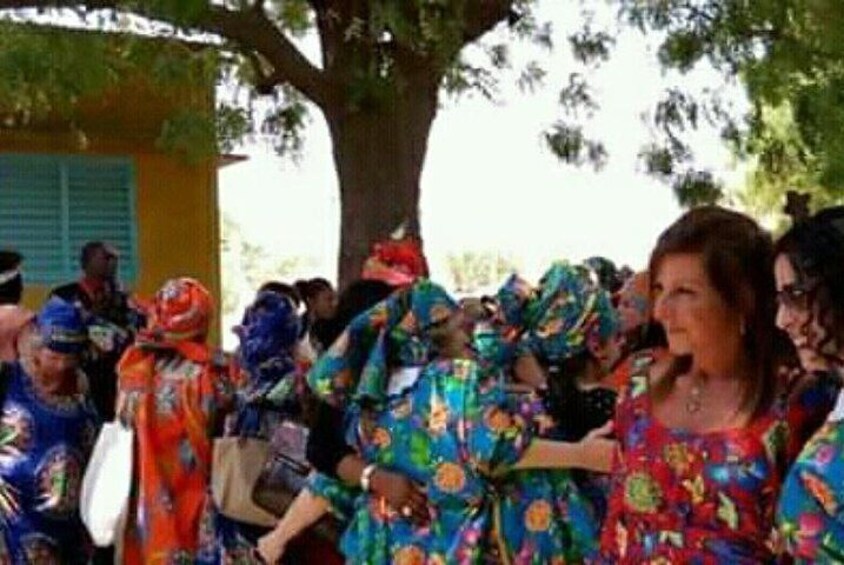 Some tourists dressed like local Senegalese ladies