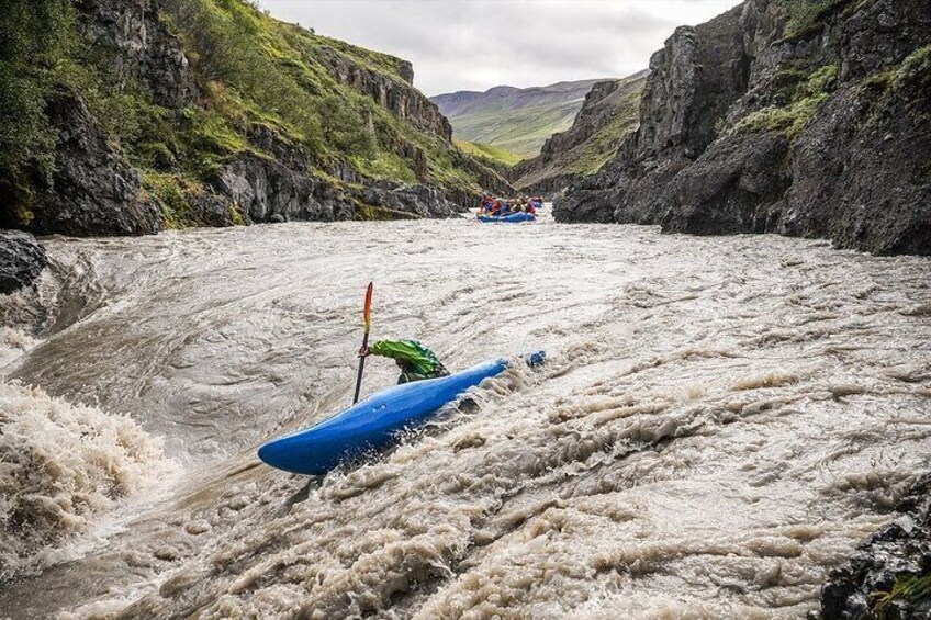 Safety kayakers in action