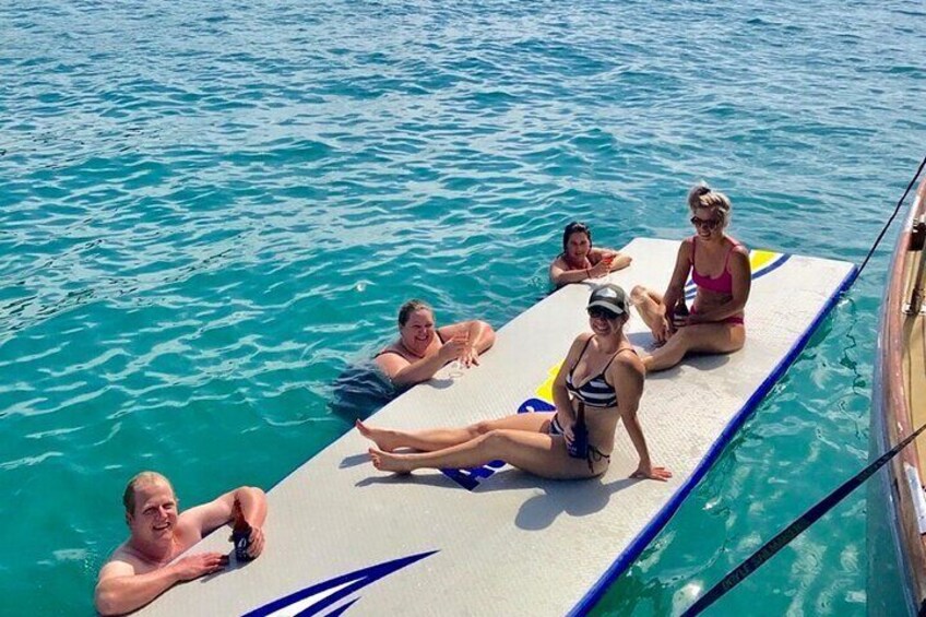 Relaxing on the giant inflatable mat