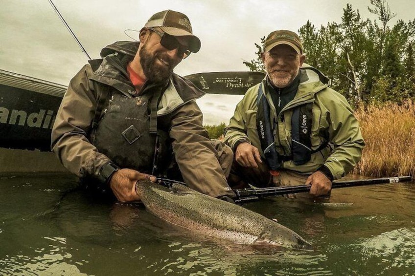 John with a monster Kenai River Rainbow Trout.