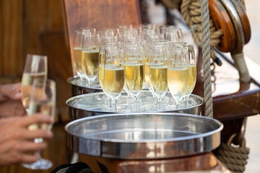 Freshly poured sparkling wine is waiting for you upon boarding