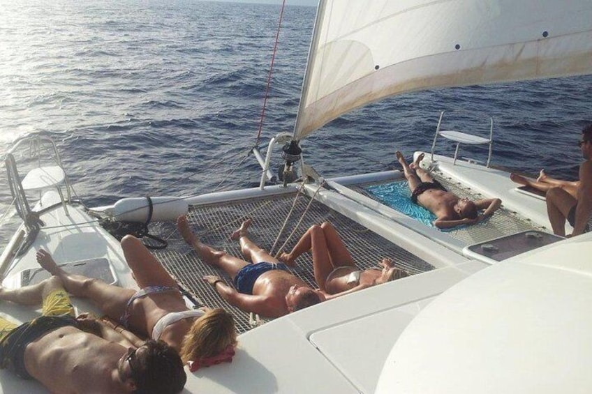 Enjoy the trampoline of our luxurious catamaran