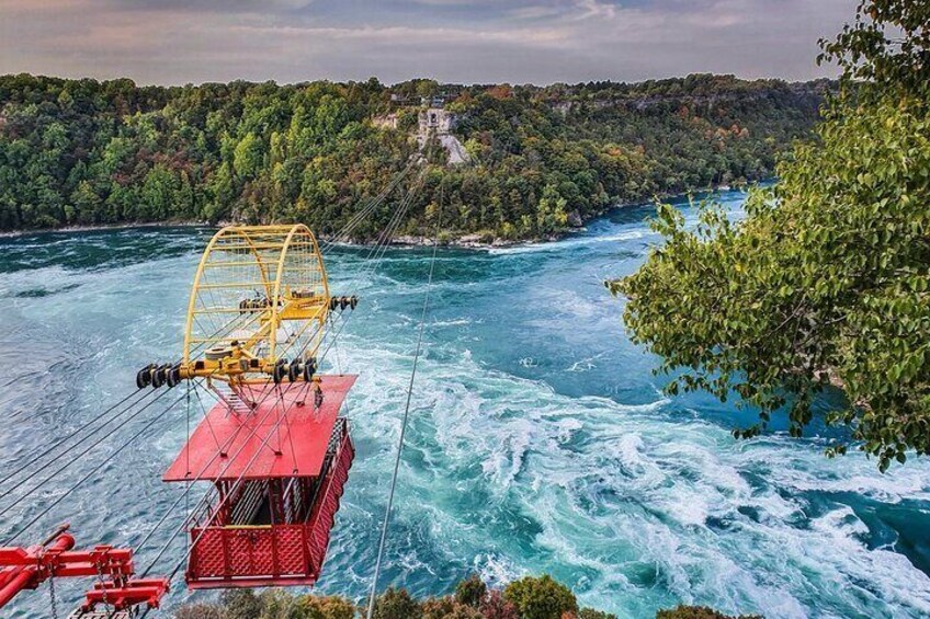 Whirlpool Aero Car over Niagara Falls Rapids. The cable car traveling between Canada and United States.