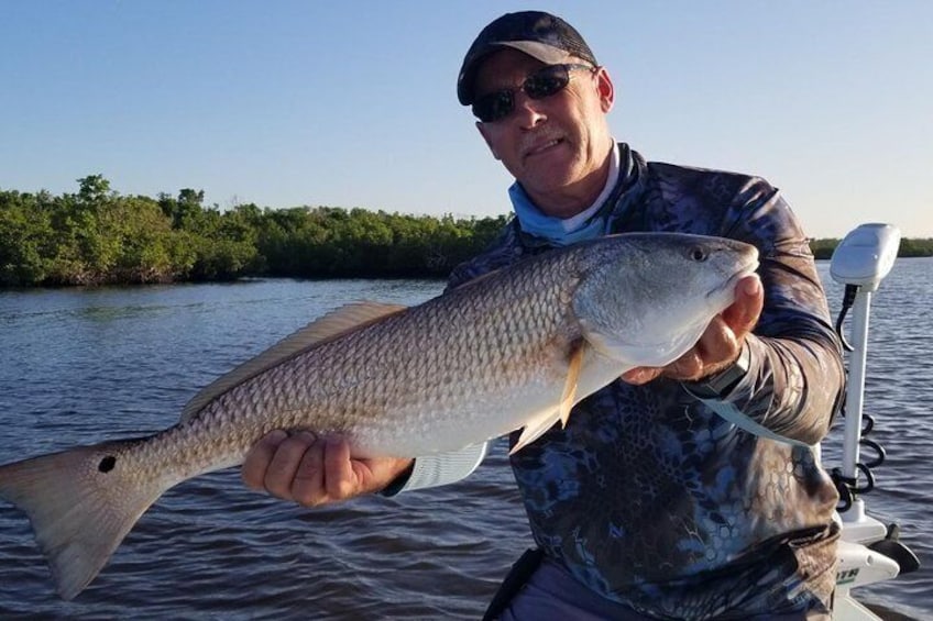Tom with a trophy redfish