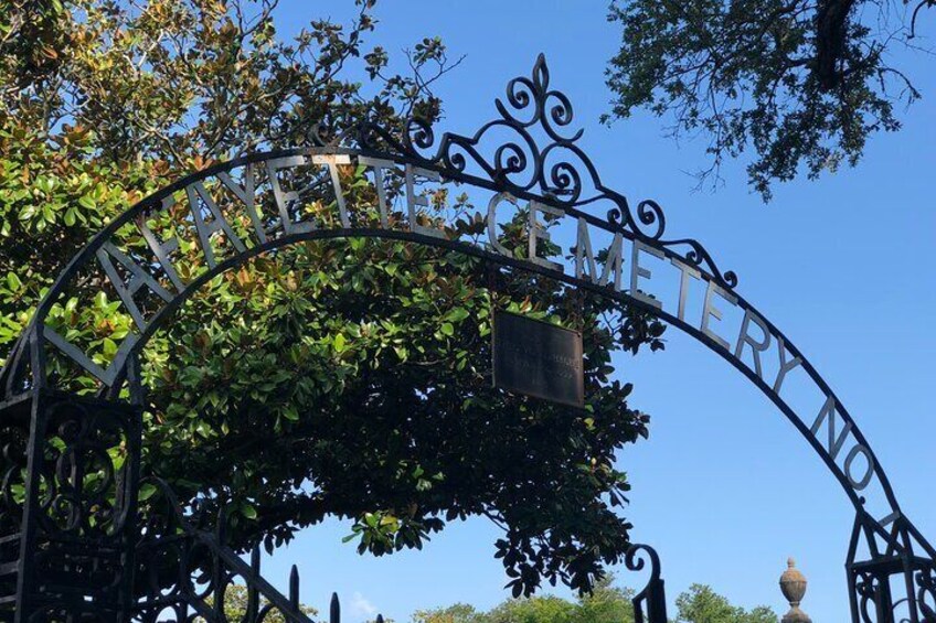 We stop at the gates of Lafayette Cemetery to discuss death culture and local funerary practices.