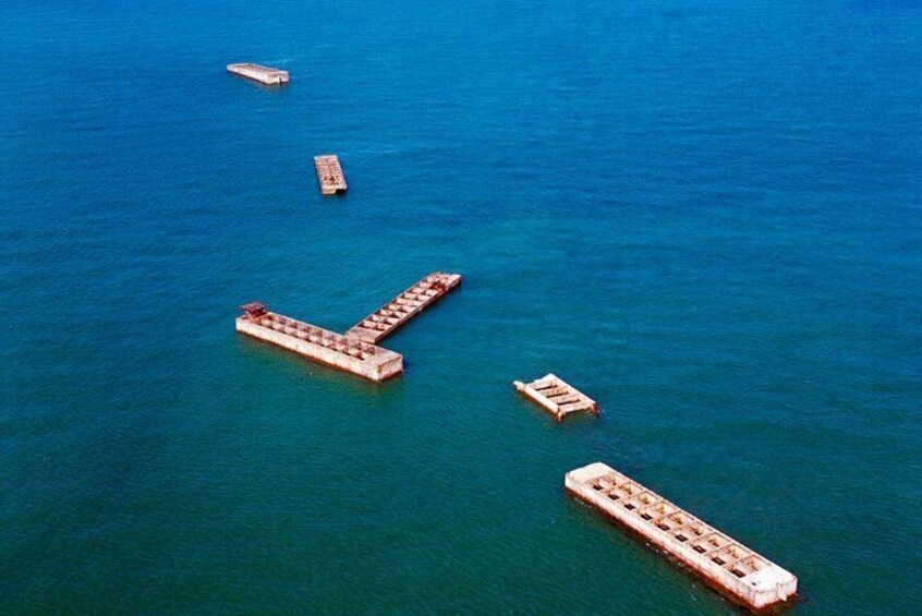 Remnants of the artificial port of Arromanches-Les-Bains