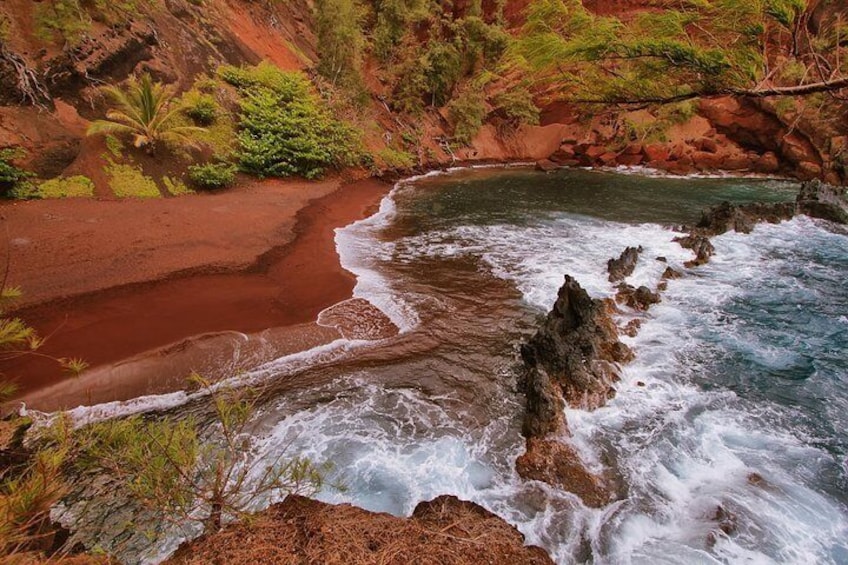 We take you to a red sand beach