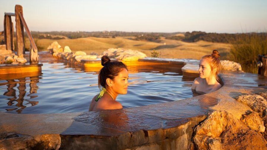 Peninsula Hot Springs Bath House - Sunset on the hilltop pool