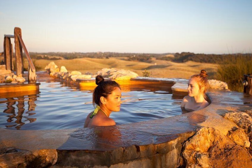 Peninsula Hot Springs Bath House - Sunset on the hilltop pool