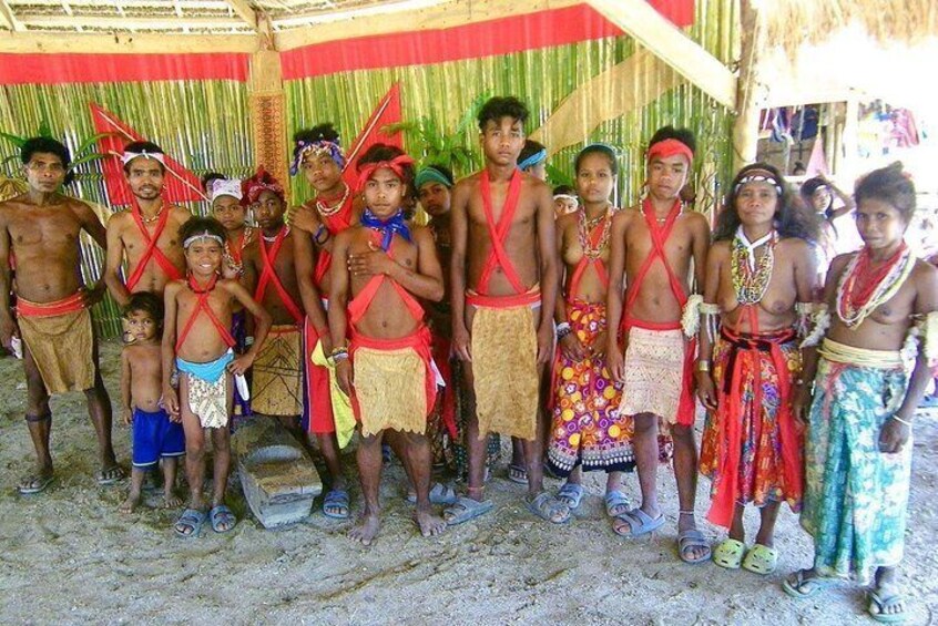 Some member of the Batak tribe poses for a photo