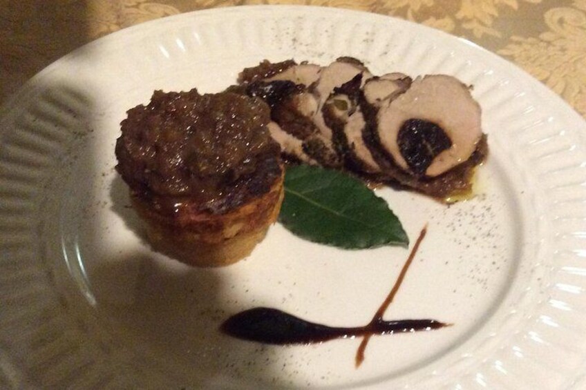 Pork fillet with prunes with potato souflle