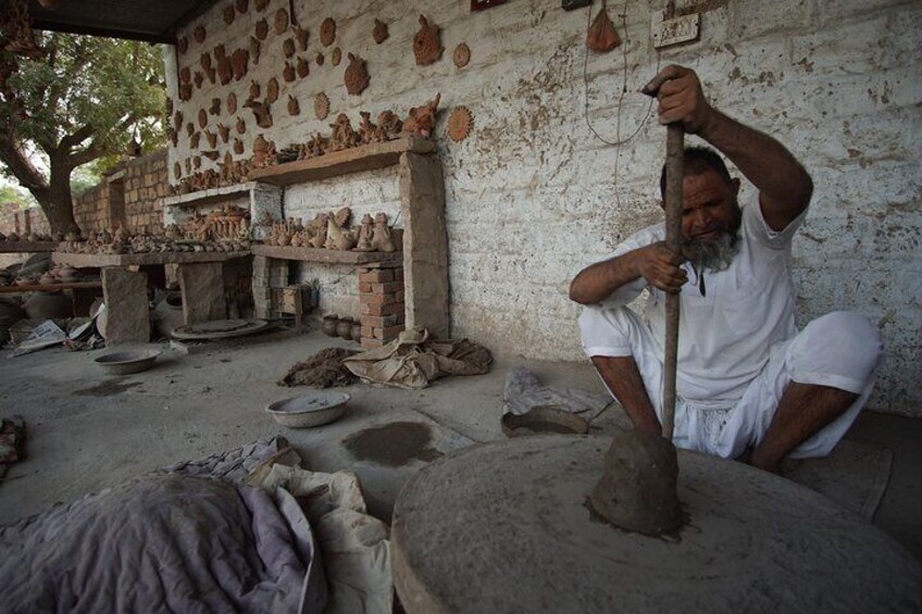 making pot on wheel