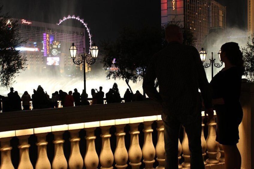 Start the evening watching the Bellagio fountains before hopping into a limo