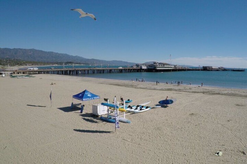 Meet us at our West Beach location on the sand to the right of the pier