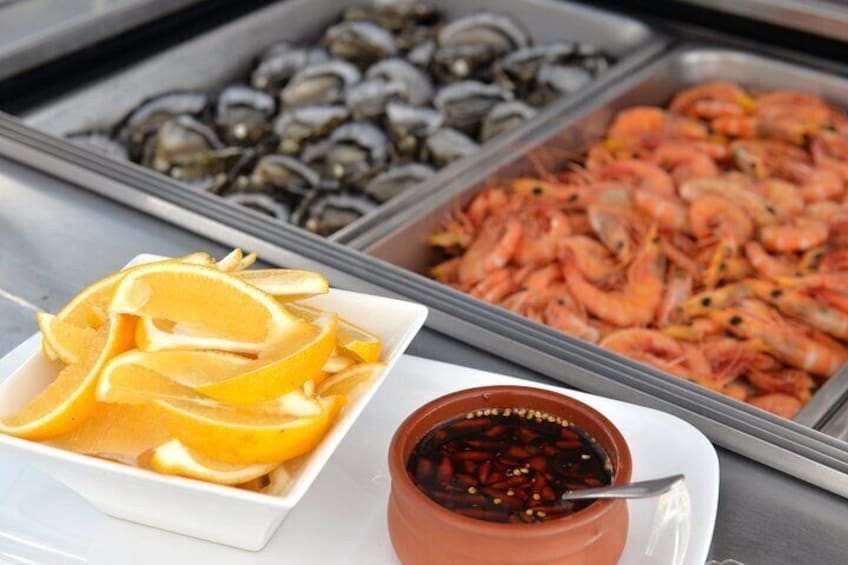 Fresh Coffin Bay oysters and gulf banana cooked prawns