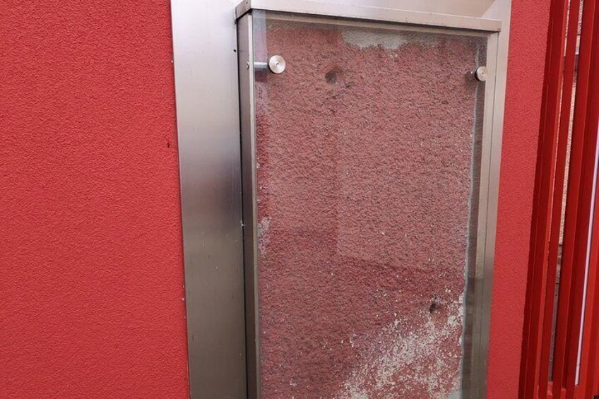 Show item 5 of 26. Bullet holes from Bloody Sunday.
