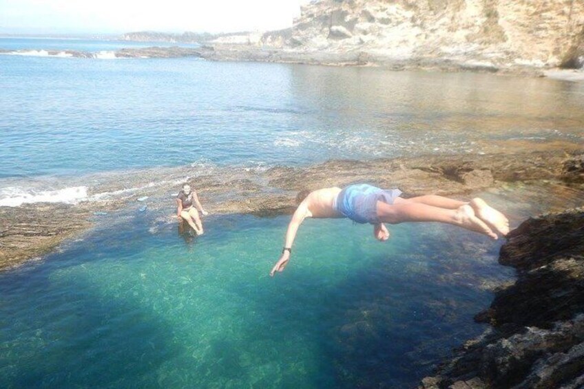 Enjoy a rock pool swim before morning tea in a secluded cove!