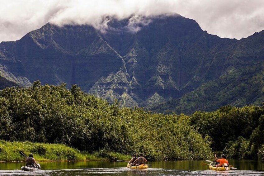 Hanalei river paddle with cascading waterfalls 