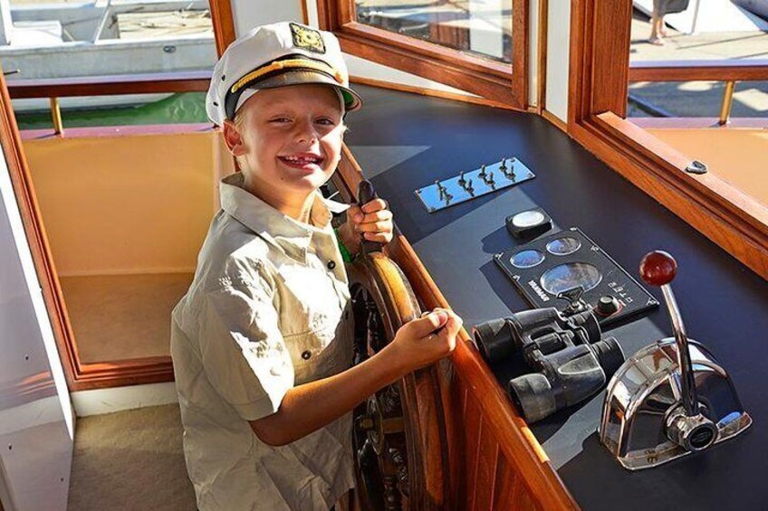 Kids can have a drive of the boat complimentary
