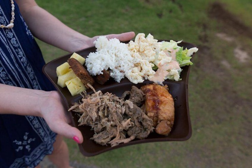 Native Hawaiian cuisine offered at the Island Breeze Luau buffet includes fresh island pineapple, steamed rice and the famous Kalua Pua’a, roast pork prepared in an underground steam oven.