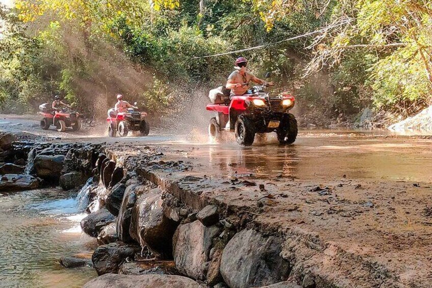 Crossing River on an ATV