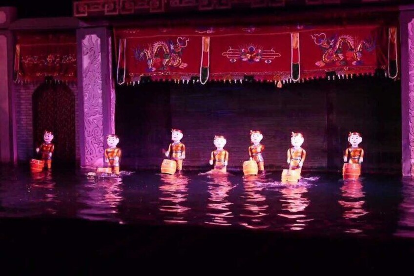 Water Puppet Show Plus Sightseeing By Cyclo and Saigon Dinner Cruise