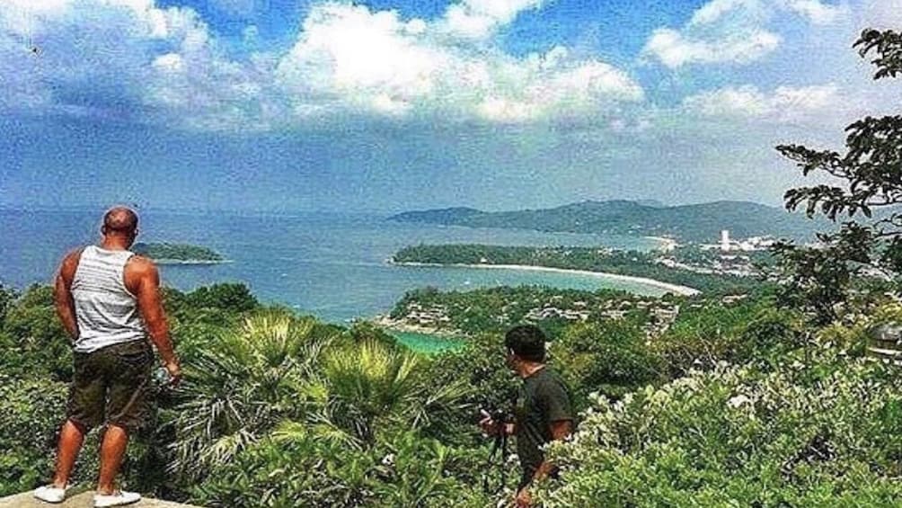 Tourists enjoying a scenic view of Phuket 