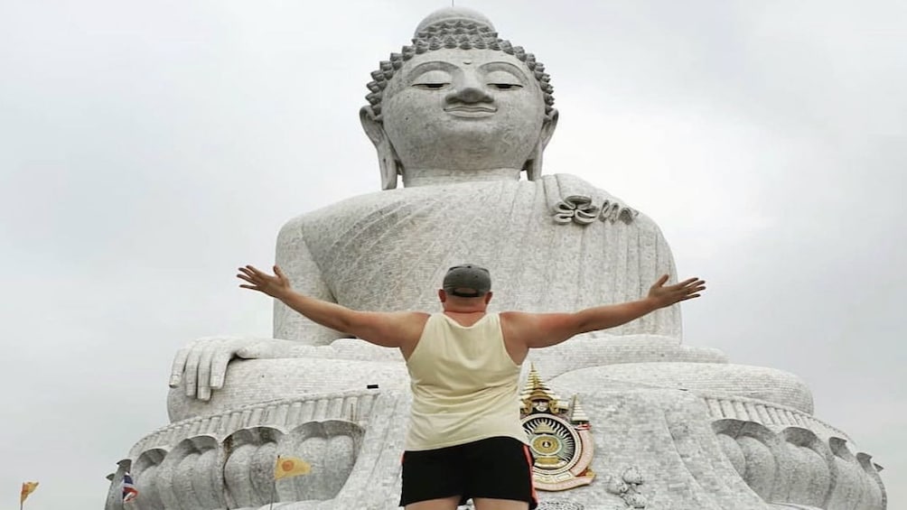 Man visiting Big Buddha in Phuket