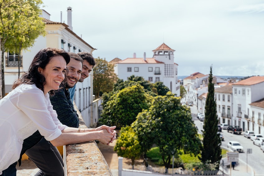 Show item 1 of 9. Tourists enjoying the view in Evora