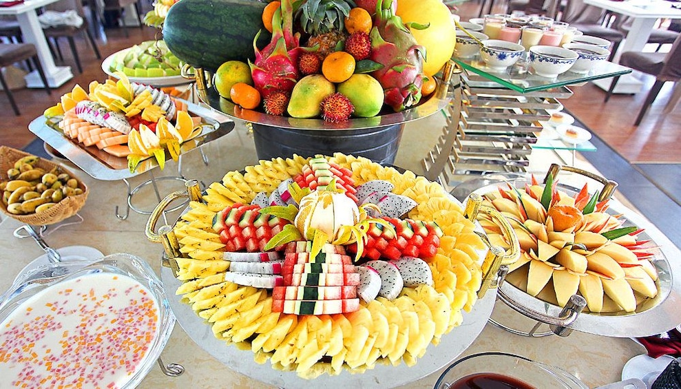Tropical fruit plates aboard the Halong Bay dinner cruise