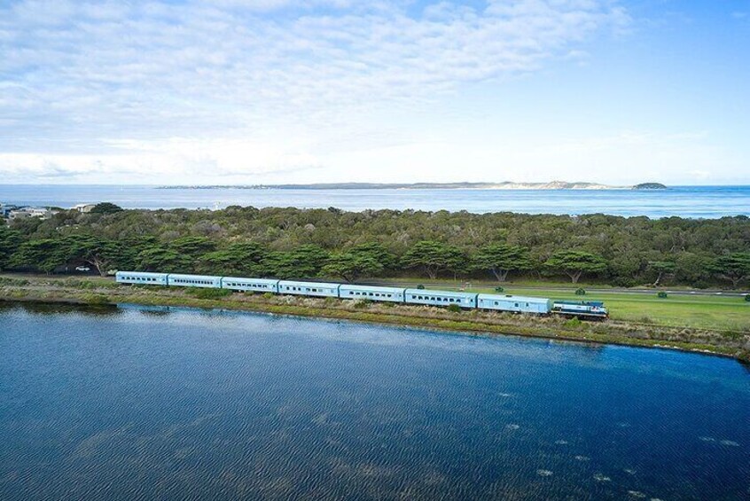 The Q Train passing by Swan Bay