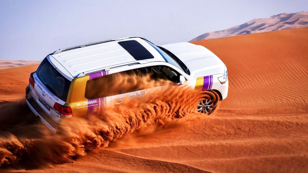 Arabian Overnight Safari With Camel Ride, Dune Bashing & BBQ