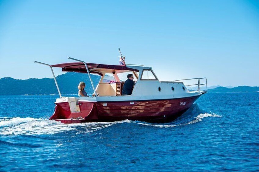 Private boat tour- explore the islands, find hidden caves and try snorkelling