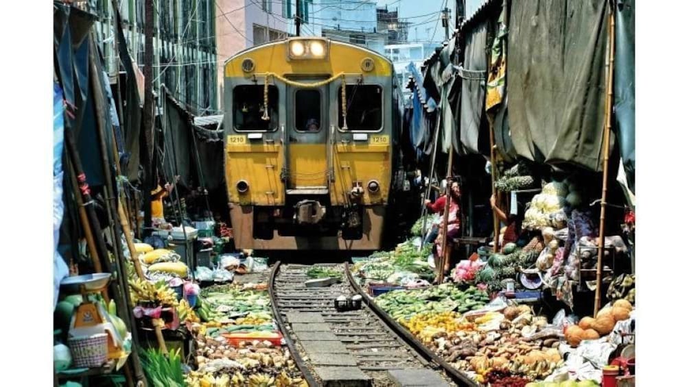 Bangkok:Risky market and floating market Damnern Saduak
