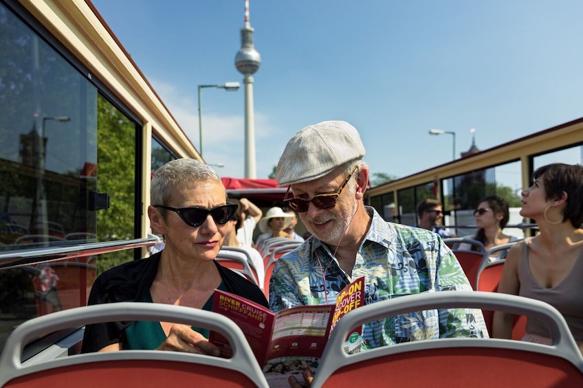 Couple on a hop-on hop-off bus in Berlin
