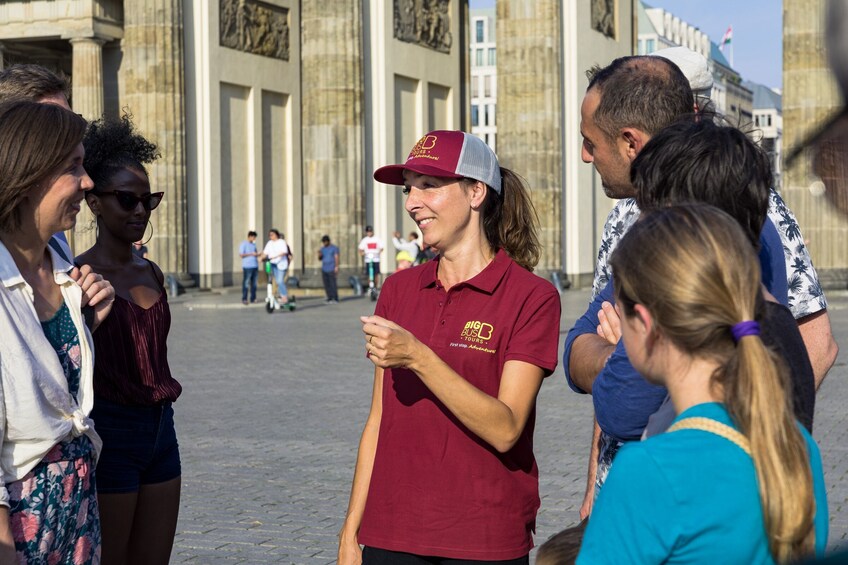 Tour guide with group in Berlin