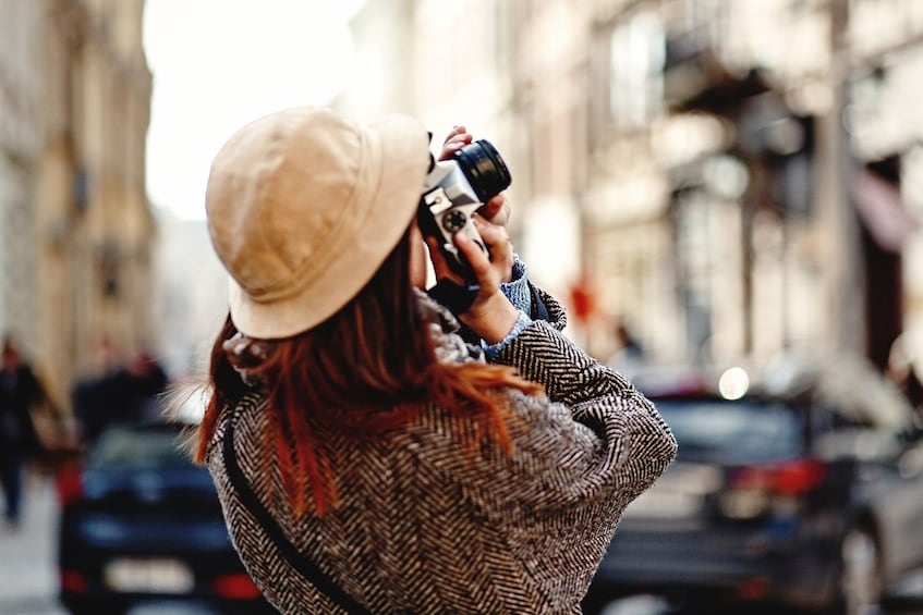 Woman taking pictures in Berlin