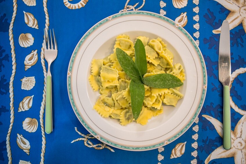 Dinner at a local's Home in Modena with Show Cooking